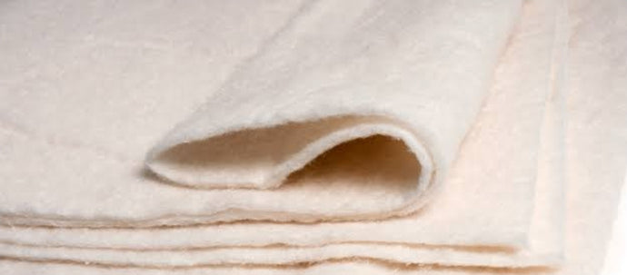Add cotton wadding (1cm thick)